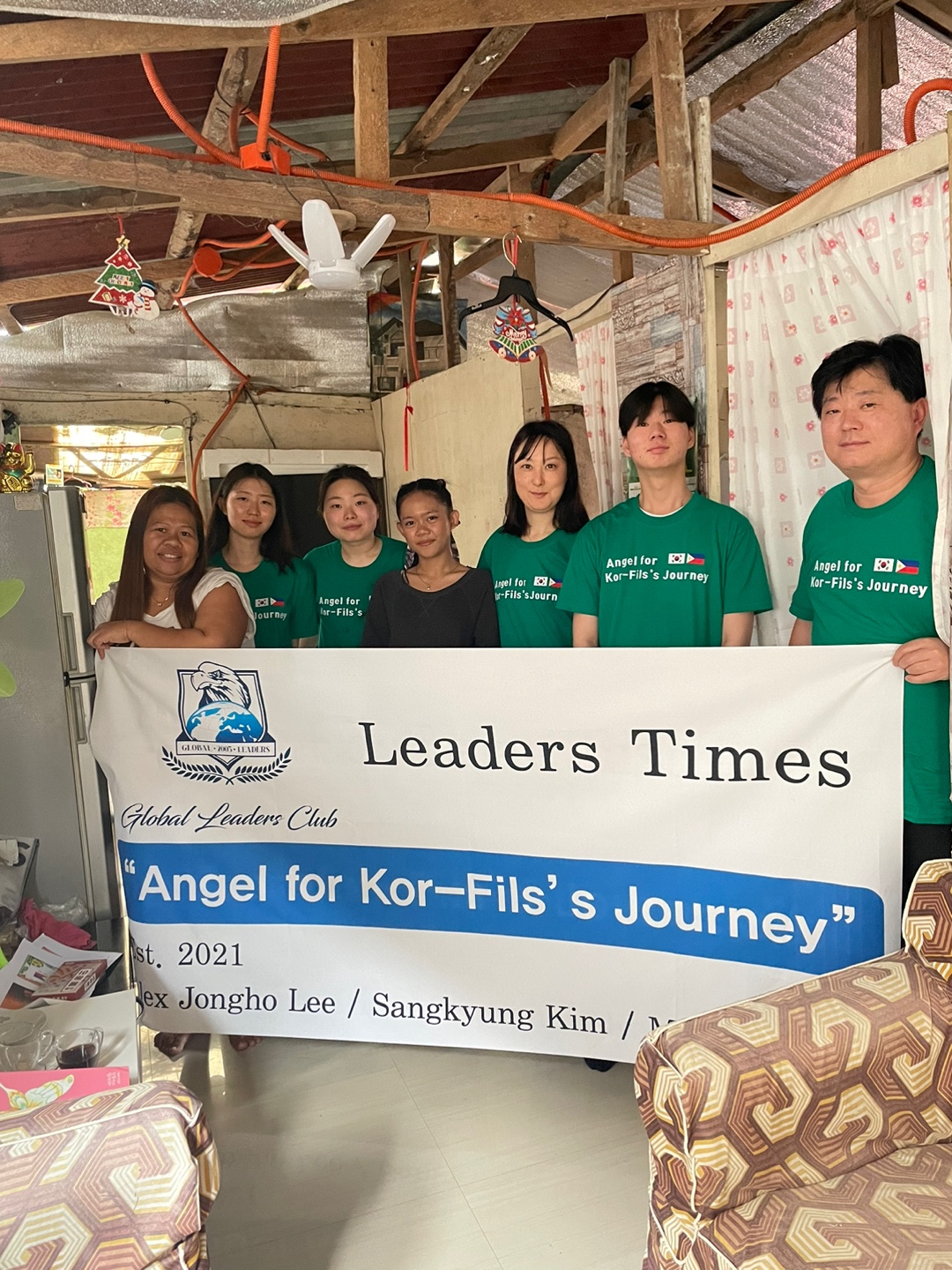 With a supported family after delivering scholarship funds in person, the way Angels for the Journey has worked since 2021.