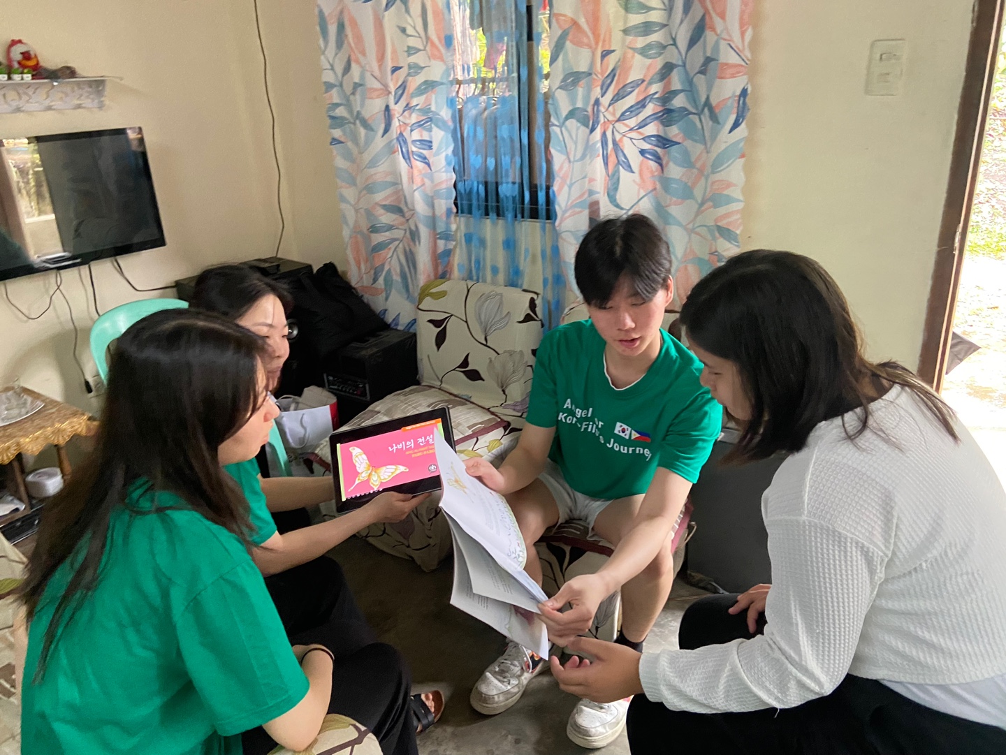 Reviewing school documents with a supported family to make sure tuition, fees, and enrollment are all covered.