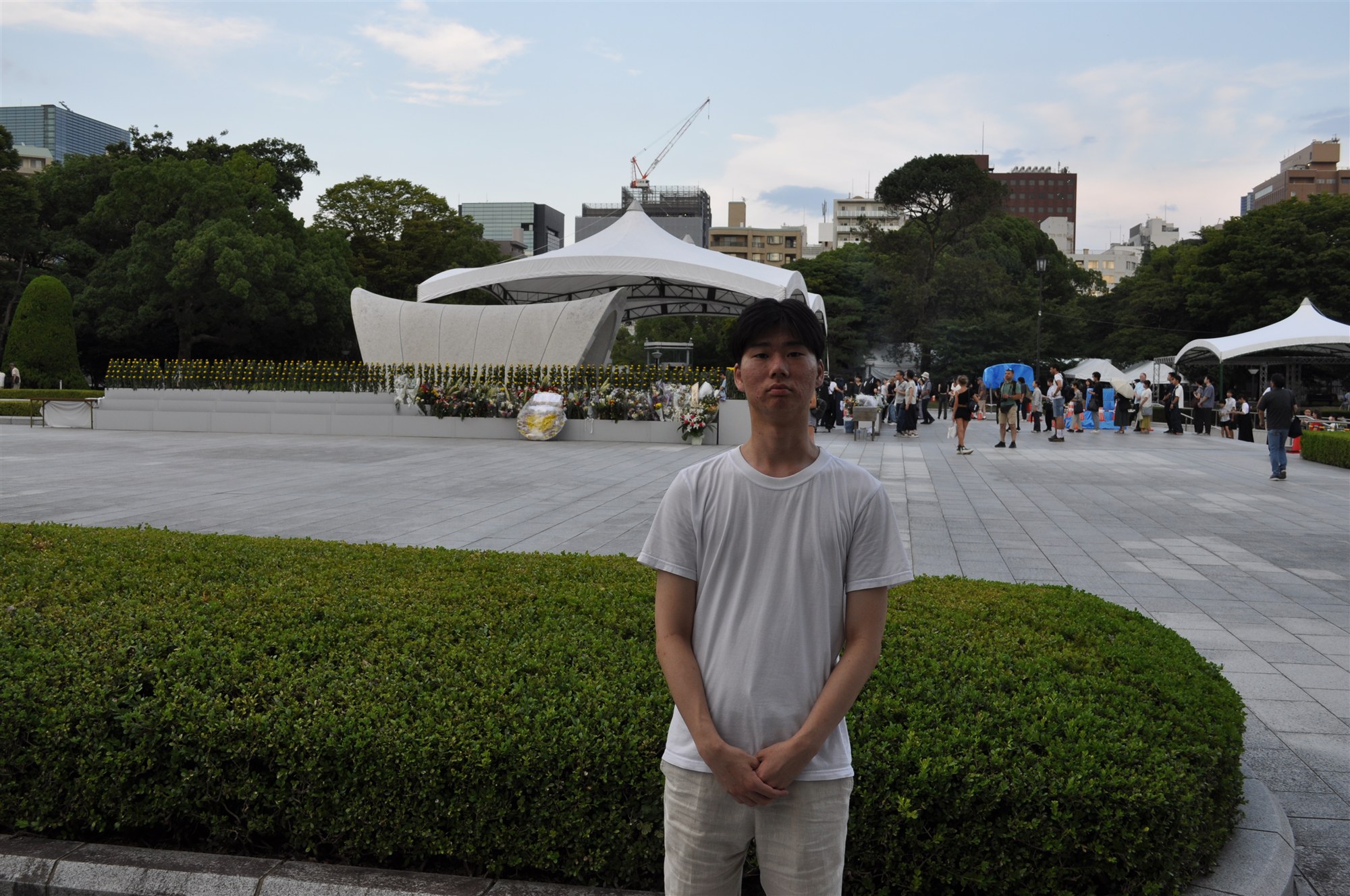 At the Peace Memorial Ceremony grounds in Hiroshima on the morning of the anniversary, among thousands gathered to remember the dead.